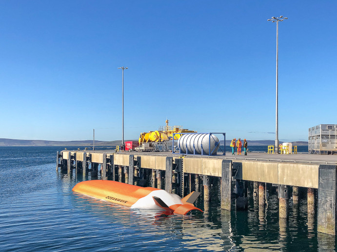 Oceanways vehicle docked beside a pier